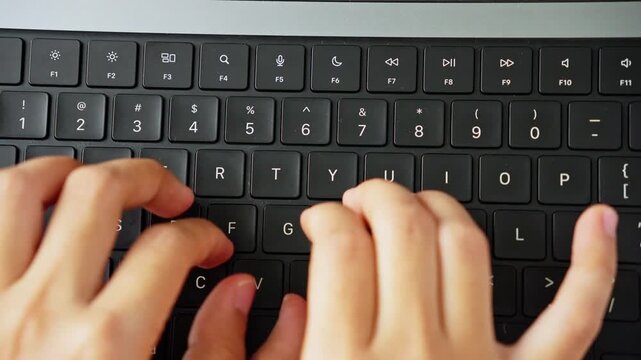 Typing on Computer Keyboard From Top View