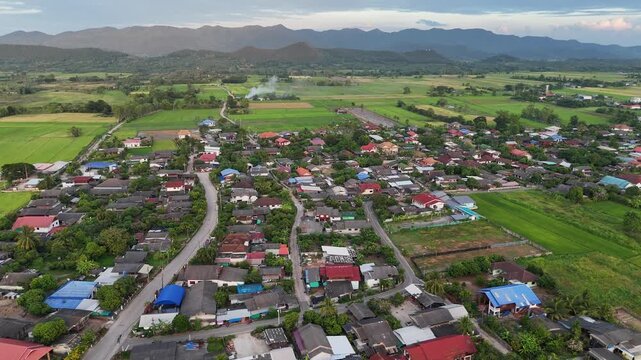 Aerial view of the countryside village in Pa Daet district one of the southern part of Chiang Rai province of Thailand at sunset.