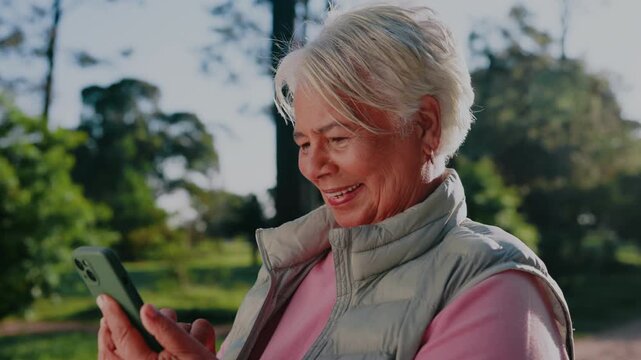 Happy, phone and old woman outdoor with digital app for social media, connection and communication. Female user, senior platform and online subscription for mental stimulation or navigation at park