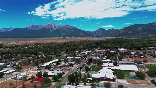 Downtown Buena Vista Rocky Mountains small town cars Main Street Summer Fall morning blue sky drone aerial Colorado Collegiate Peaks Mount Princeton Mt Yale fourteener peaks Cottonwood Pass circle