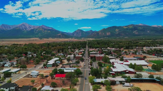 Downtown Buena Vista Rocky Mountains small town cars Main Street Summer Fall morning blue sky drone aerial Colorado Collegiate Peaks Mount Princeton Yale fourteener peaks Cottonwood Pass upwards