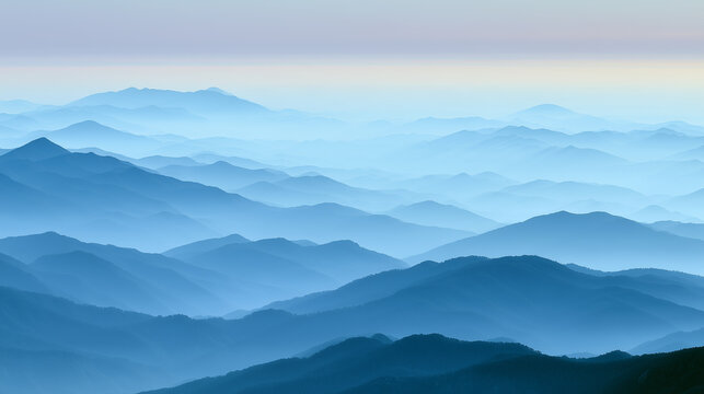 Layers of Blue Mountain Ridges Fading into Soft Morning Mist