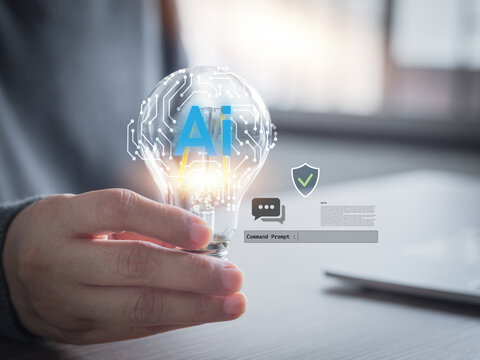 Hand holding glowing light bulb with AI brain circuit hologram, chat icon, shield, and command prompt. Concept of artificial intelligence idea, secure machine learning, and smart tech innovation.