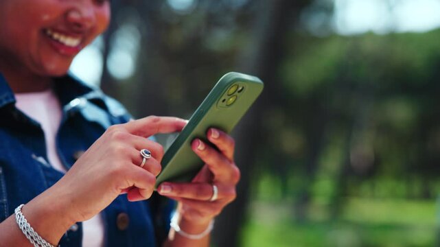 Text, hands and college student on campus with phone, online chat and funny post on social media. Digital, laugh and happy woman outdoor with tech, university meme and comic reaction on gen z blog.
