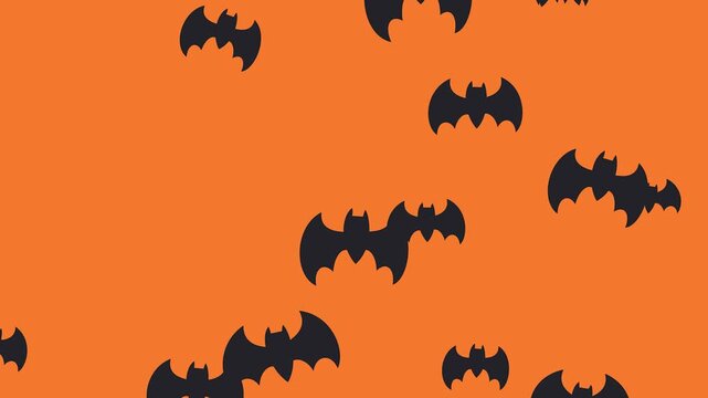 Eerie dark bat silhouettes soaring across a bright orange sky, perfect for a spooky Halloween celebration background