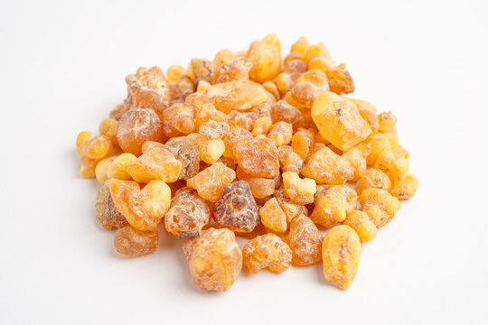 Frankincense or olibanum aromatic resin isolated on white background used in incense and perfumes.