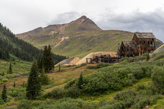 Abandoned Wooden Mining Mill Below a Mountain Peak in the San Juan Mountains
