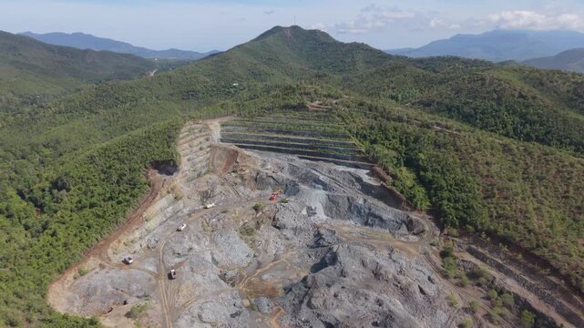 Terraced Quarry With Excavators and Trucks Near Puerto Princesa