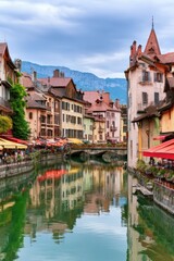 Obraz premium European canal town with historic buildings and water reflections