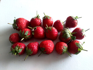 Fresh Ripe Strawberries on White Background © Grafisqueen