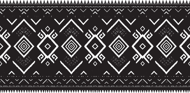 Black and white tribal ikat vector pattern with geometric diamond shapes and chevron borders for ethnic textile fabric design and traditional backgrounds