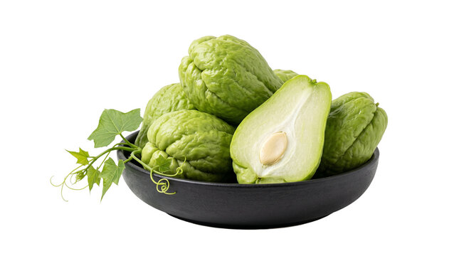 Fresh chayote squash arrangement in a black bowl on a dark background