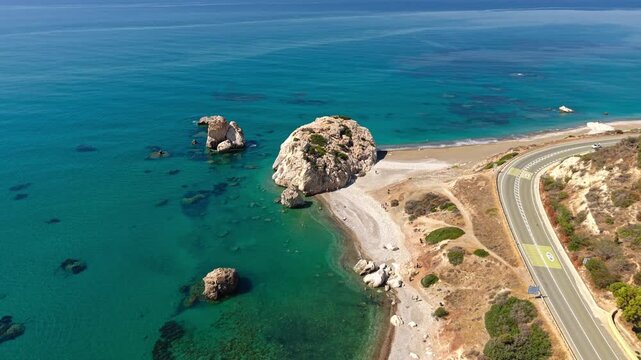 Drone View of Petra tou Romiou Rock and Beach, Natural Landmark on Coast of Cyprus and Mediterranean Sea