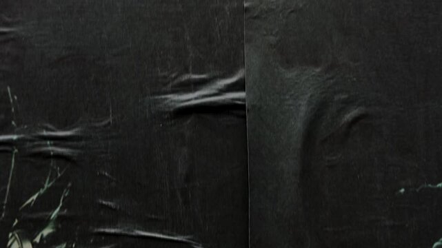 Torn black weathered paper texture animation
