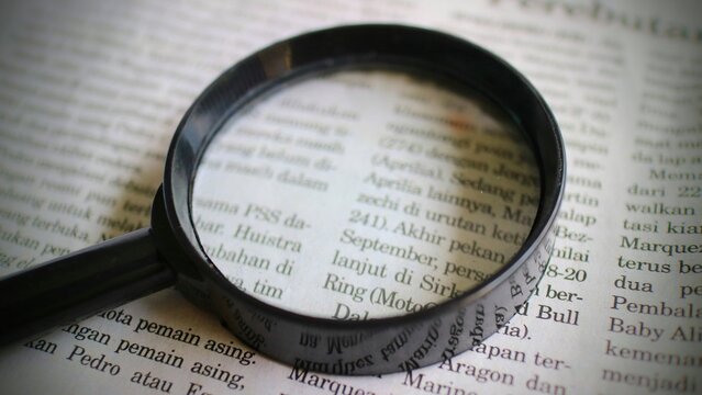 Magnifying Glass Magnifying Newspaper Text Research Analysis Concept Close Up View