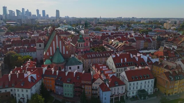 Aerial Drone View of Warsaw Old Town and Royal Castle on a Sunny Day