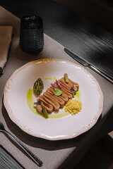 Foie gras pate appetizer with green sauce © AntAlexStudio