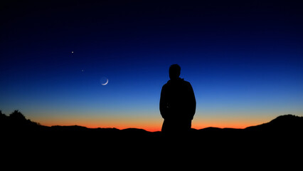 Fototapeta premium Amateur astronomer observing stars, planets and other celestial objects.