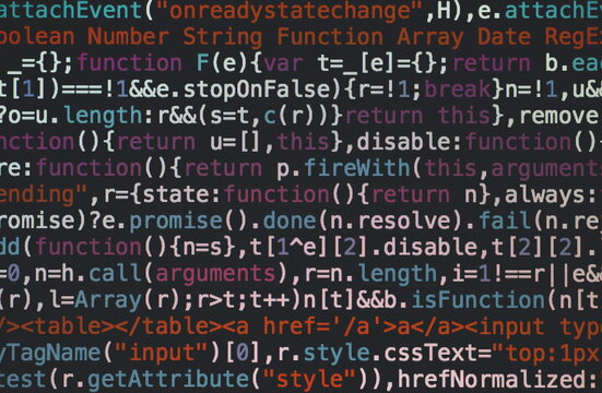 Close up of colorful JavaScript computer source code syntax on a dark monitor screen for software programming background
