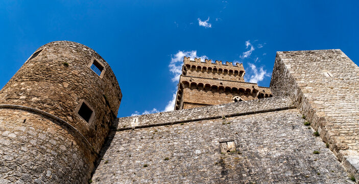 Historic Stone Castle Against Blue Sky