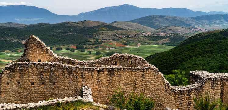 Ancient Stone Ruins Overlooking a Lush Valley