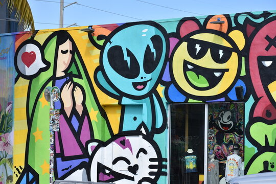 Colorful Wynwood Walls sign in Miami's famous Wynwood Art District, a vibrant tourist destination known for graffiti, street art, murals, contemporary art and creative urba