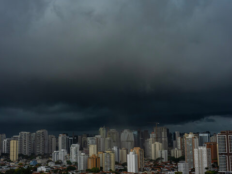 Massive, dark storm clouds packed with rain are approaching the city, signaling an imminent downpour and severe weather. Brooklin District, S&atilde;o Paulo City, Brazil, South America. 10-05-2026