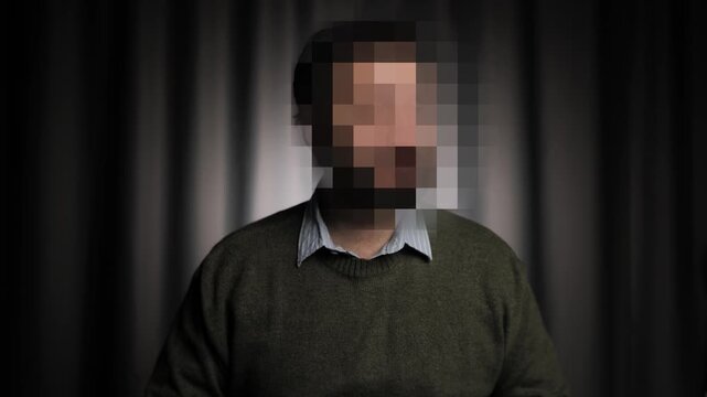 Hidden identity, hidden face, unknown person, silhouette interview. Man talking interviewer and looking at camera, his face is hidden
