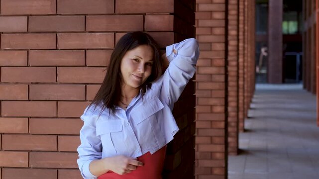 Woman enjoying a relaxed urban moment, expressing personal style, independence, and the freedom to feel comfortable in her own identity