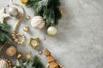 Fototapeta premium Scandinavian Christmas flat lay with bauble and pine branch