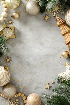 Scandinavian Christmas decoration frame with gold baubles and fir