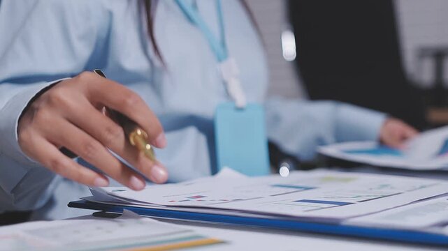 Meeting of the Asian business team To analyze and discuss the situation in financial reports in the conference room. investment consultant financial advisor and accounting concepts.
