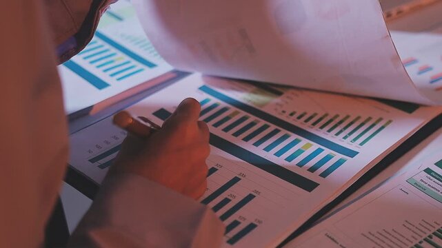Meeting of the Asian business team To analyze and discuss the situation in financial reports in the conference room. investment consultant financial advisor and accounting concepts.