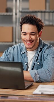 Logistics, success or man in office with laptop, sales growth or good news for ecommerce store. Distribution, shock or happy entrepreneur with fist pump, bonus review or revenue increase for webshop.