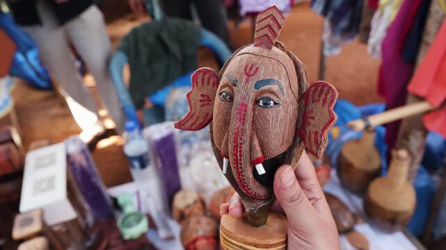 Handmade Coconut Shell Ganesha Crafts Displayed at Indian Artisan Market