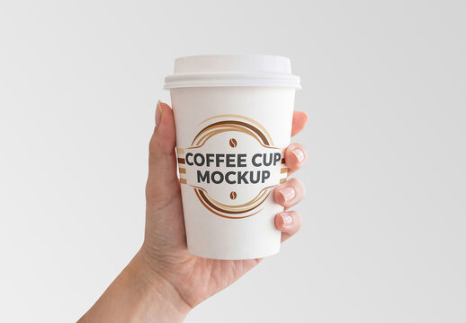 Large White Coffee Cup In Woman&rsquo;s Hand Mockup
