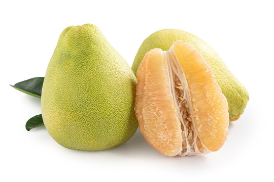 Fresh pomelo fruit with leaf isolated on white background with clipping path.