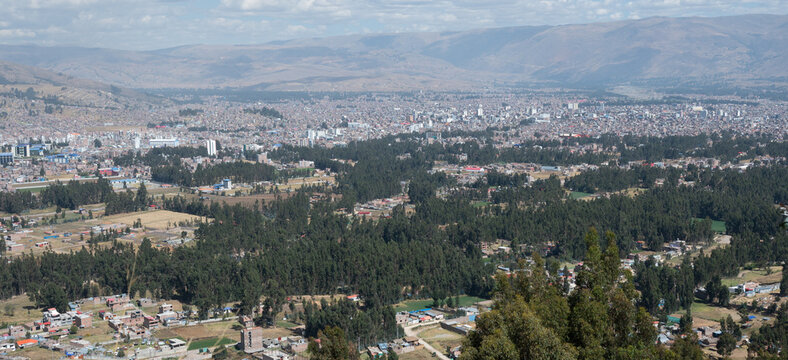 Huancayo, Peru (Per&uacute;) : A panoramic view from Cerro Achkamarca shows Huancayo spreading across the Mantaro Valley beneath the Andes. Dense urban neighborhoods occupy the center of the valley.