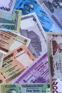 Big amount of Bangladeshi taka money banknotes. Bangladesh cash bills of BDT currency close up