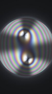 Conoscopic Interference Figure With Swinging Isogyre Brushes In Polarized Light Seamless Loop in deep gray tones vertical 9:16