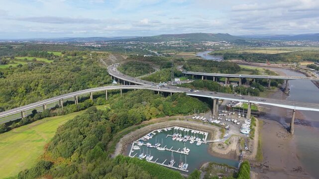 Wide Aerial Landscape View of M4 Overpass Road on River Neath with Marina.