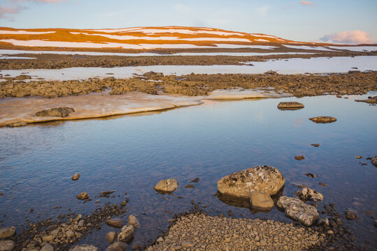 Bank of River Bunisyak. Polar day on Putorana Plateau. Russia