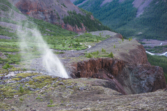 The water is being blown out of the waterfall. Putorana Plateau summer. Russia