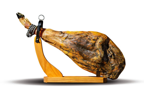 Jam&oacute;n espa&ntilde;ol en el jamonero. Jam&oacute;n curado tradicional espa&ntilde;ol sobre soporte de madera aislado con fondo PNG transparente para gastronom&iacute;a