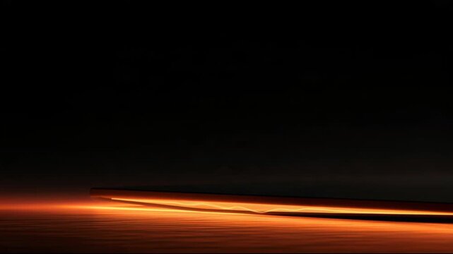 Glowing orange light trails sweep across a dark black surface in an abstract style, suggesting energy, speed, and technology