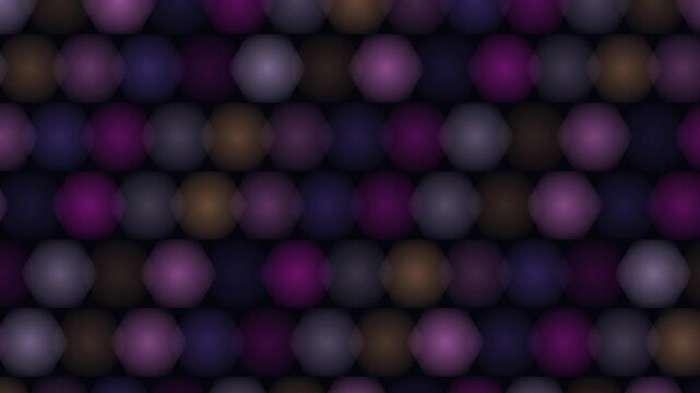 Blurred overlapping circular bokeh patterns display soft purple and dark warm hues against a black background.