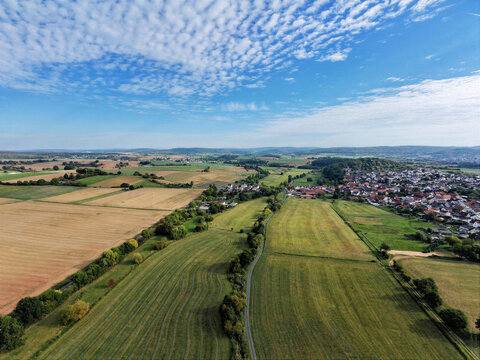 Farmland and Village Under Altocumulus Sky, Hesse, Aerial