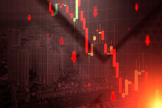 Stock market crash and economic crisis concept with a falling candlestick chart and red downward arrows overlaid on a modern city skyline. Finance and economic concept