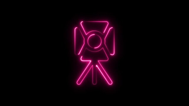 Pink neon light icon of a studio spotlight on a tripod