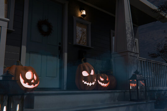 Glowing carved Halloween jack-o'-lanterns with sinister faces light up a house porch at night alongside vintage candle lanterns and a wreath creating a spooky holiday atmosphere. Happy Halloween